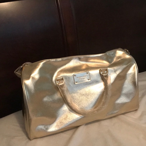 Michael Kors Handbags - Michael Kors duffle NWOT